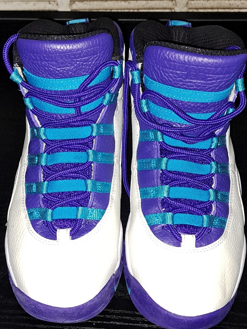 Jordan Black Sneaker Interior with Purple Trim and White Size Tag